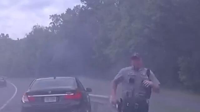 Dashcam video shows officer on side of road narrowly escape careening BMW Shorts