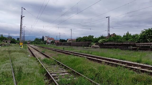 Unusual Route: Long BDZ Train with empty Passenger cars at Svetovrachene Train Station in Bulgaria