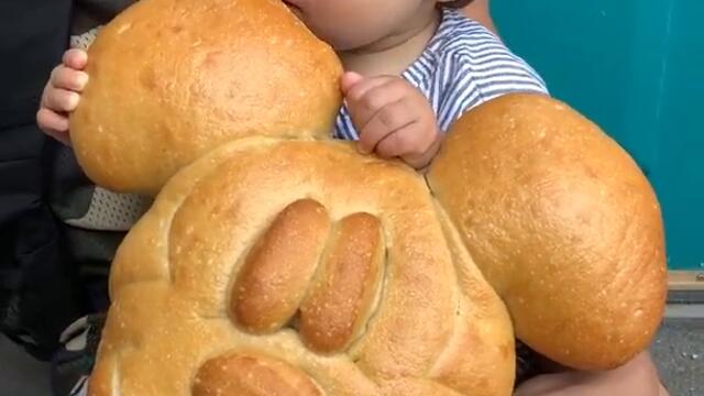 Hungry toddler tries eating HUGE Mickey Mouse bread #shorts