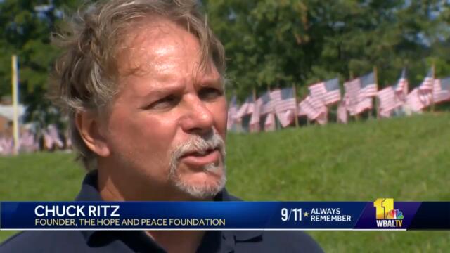 'Path of Honor' lines Parkville street with thousands of flags