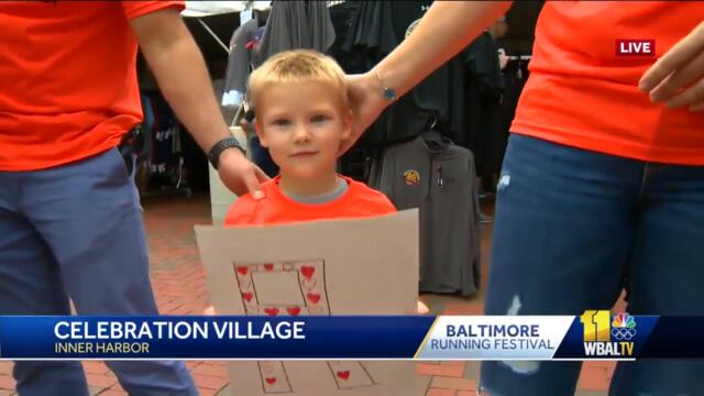 Fans cheer on runners at Baltimore Running Festival