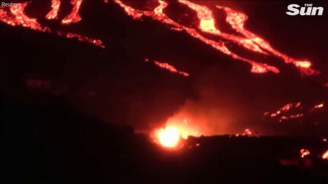 Buildings burn as lava continues to flow from La Palma volcano eruption