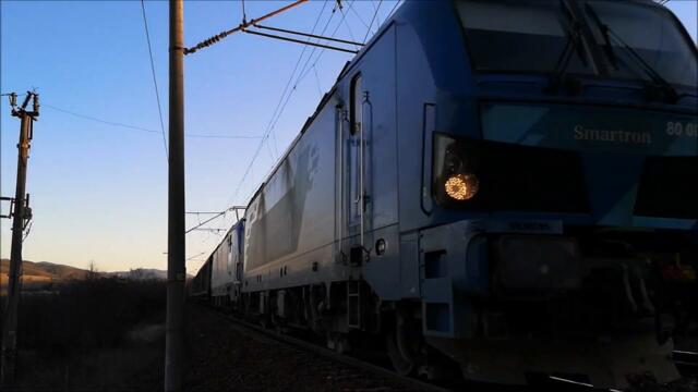 BDZ Passenger Train meets PIMK Rail Freight Train nearby Verinsko Train Station in Bulgaria