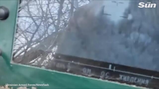 Ukrainian forces cheer as they destroy Russian helicopter with anti-tank guided missile in Kharkiv