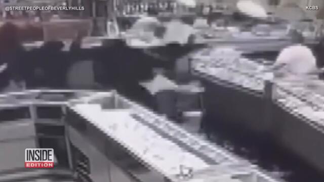 Woman Robbed of Jewelry and Cash at Gunpoint in Garage