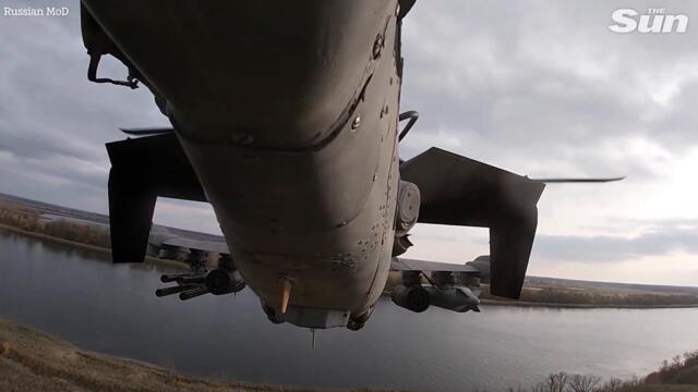 Russian attack helicopters take to the sky before firing missiles at targets