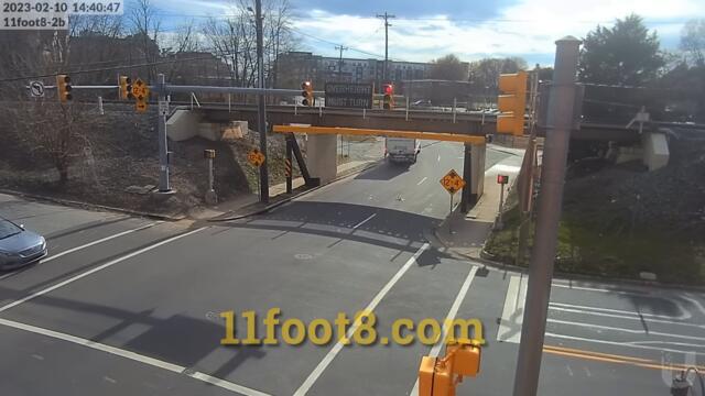 Speeding truck runs red light and hits the 11foot8+8 bridge