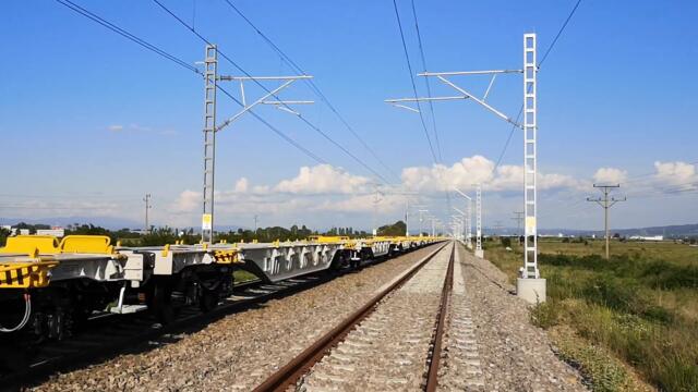 DB Rail Cargo Train with empty platforms nearby Iskar Train Station in Bulgaria
