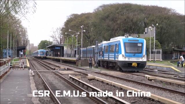 Argentina Railways freight train cross main line Haedo station, Argentina - electricos y carbonero