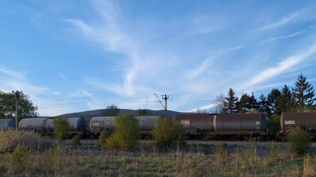 Bulmarket Freight Train meets BDZ Regional Train Karlovo - Sofia at Sarantsi Train Station, Bulgaria