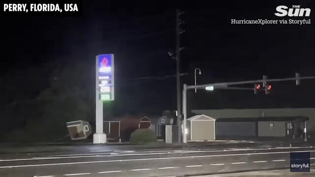 Helicopters rescue trapped victims as cars submerged & roofs ripped off by deadly Hurricane Helene