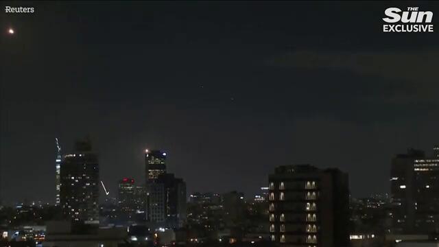 Iran launches 102 missiles into Israel as civilians rush to bomb shelters & sirens blare