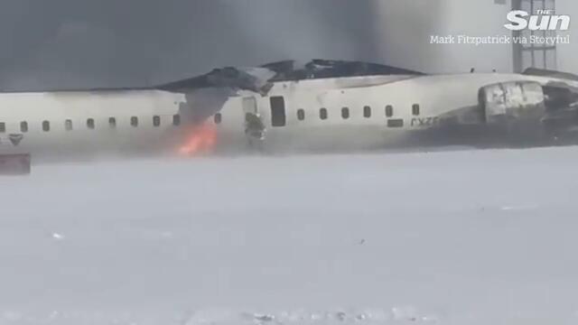 Horror moment Delta plane crashes in fireball before flipping onto its roof