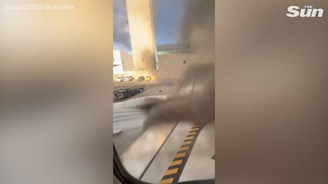 US plane burns on runway after bursting into flames in Denver