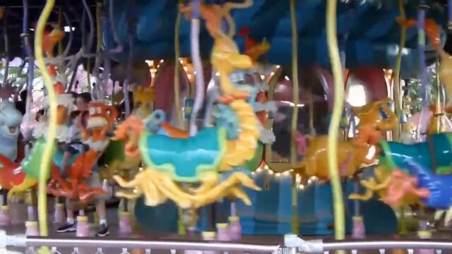 Charlotte on the Seuss Carrousel - Islands of Adventure 2010